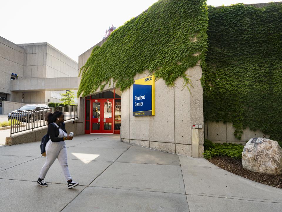 Student outside the Student Center first floor enterance