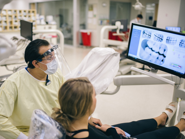 A dental student practicing on real patients in GRCC's Dental Clinic.